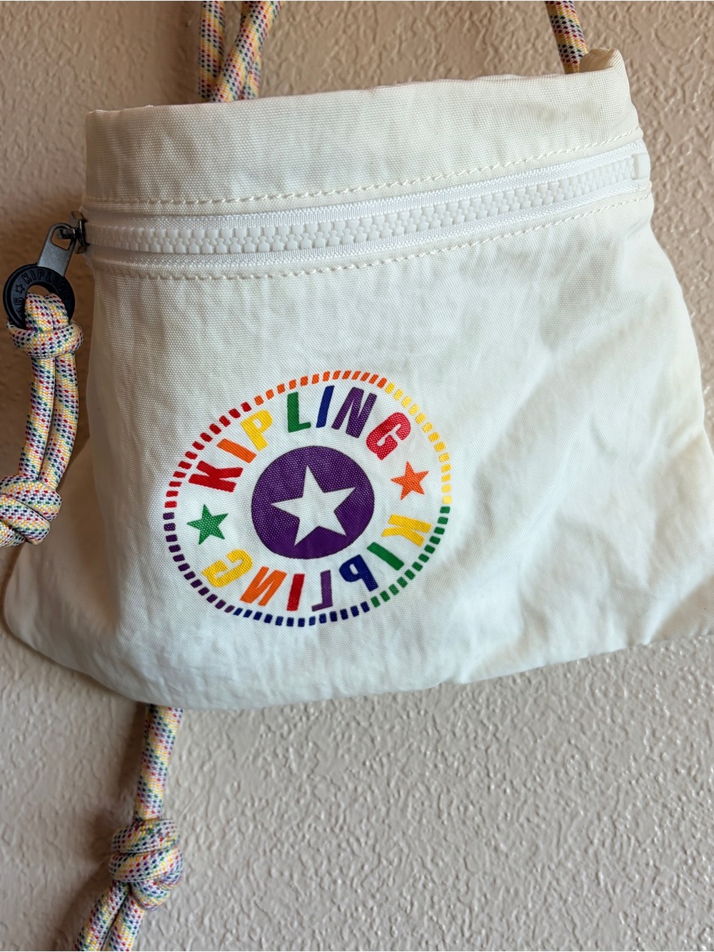 Kipling Cream Crossbody Bag with Rainbow Logo and Braided Strap